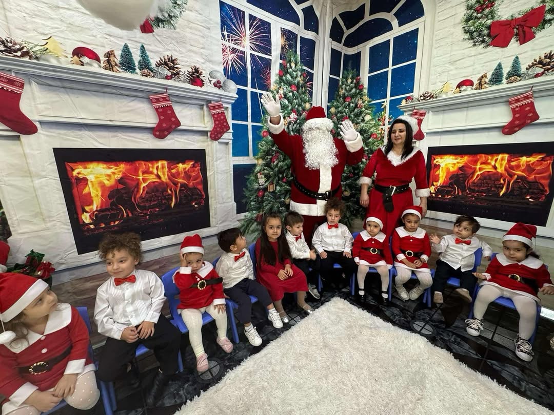 Santa and Mrs. Claus visiting the children at Arianna's Day Care for the holidays